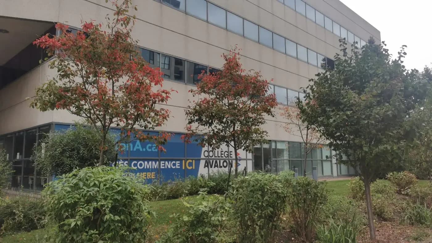Exterior of a College Avalon building with the college name visible; the official gallery does not identify the campus city.