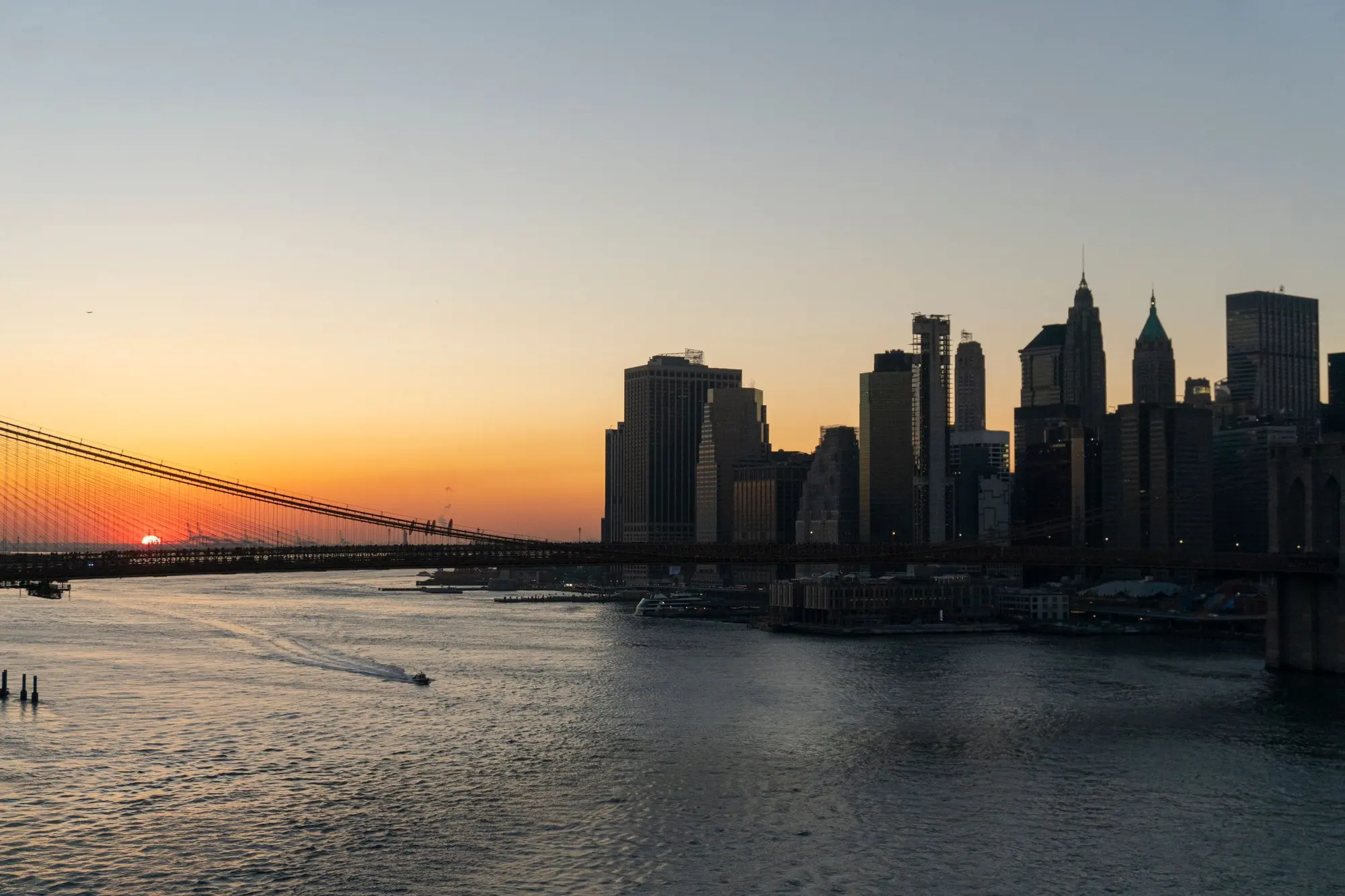Brooklyn Bridge and the Manhattan skyline at sunset, New York City
